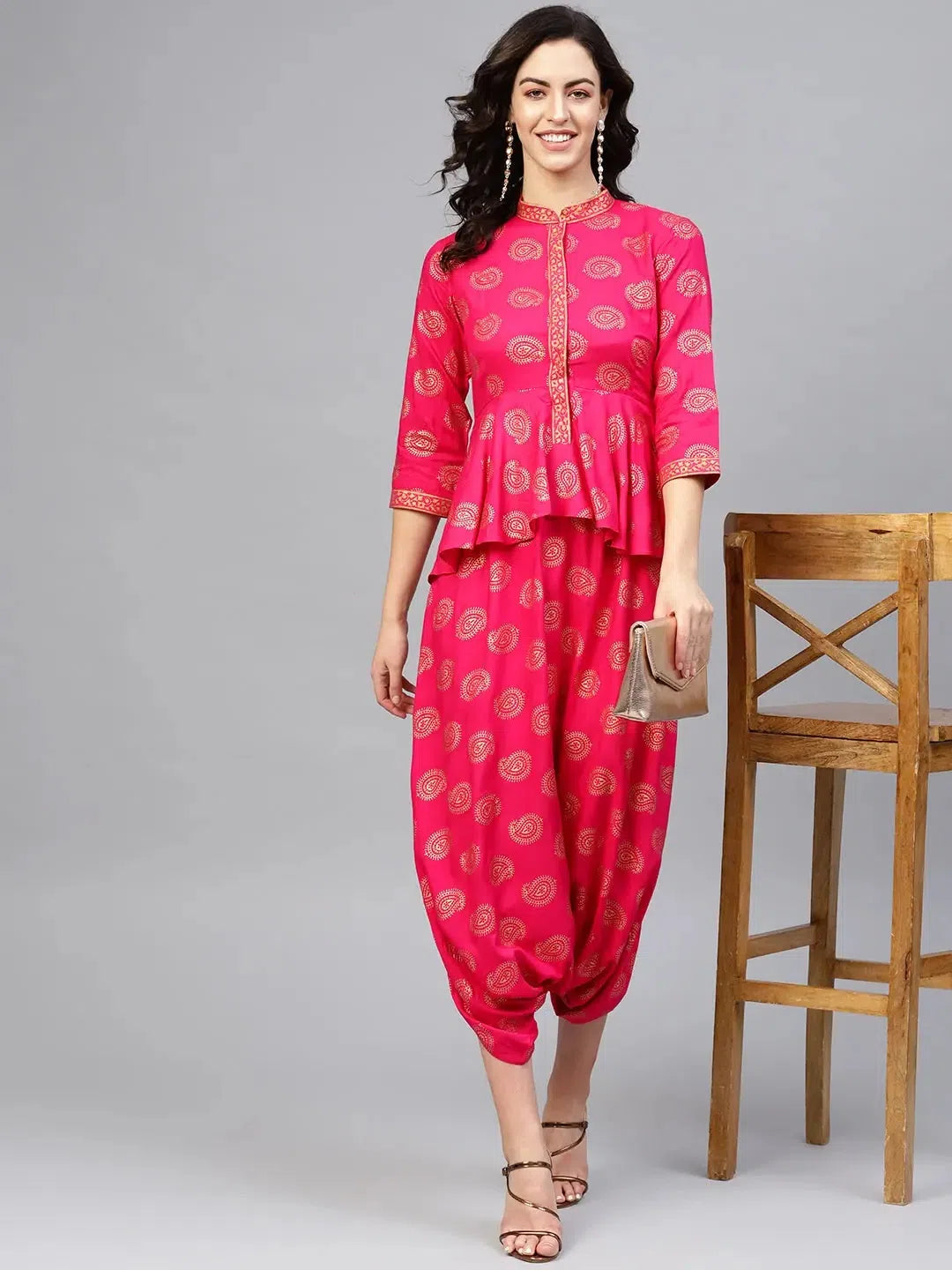 Peplum yoke with low crotch printed jumpsuit in Pink